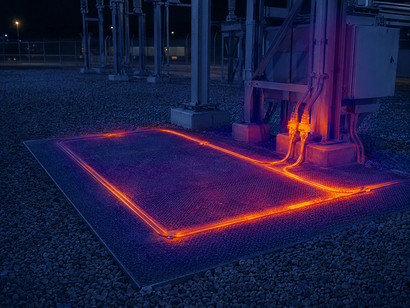 thermal-camera view of substation grounding-mat area at night